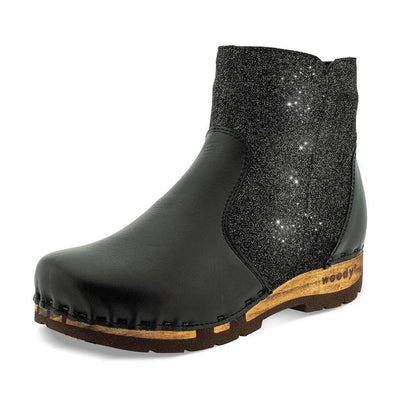 Clogs Damen Olga schwarz glänzend Steifelette woody. olga, clog stiefelette damen mit biegsamer nachhaltiger holzsohle, farbe: nero-argento (schwarz - schwarz mit silbernem glitter), holzclogs woody, woody schuhe, woody shoes, handgemachte holzschuhe aus österreich, kärnten